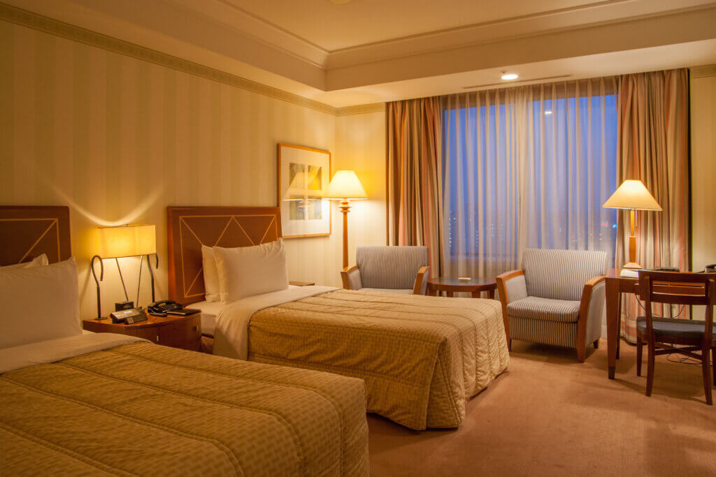 Photograph of the one of standard twin bedrooms, on regular floors of the Imperial Hotel, Osaka, Kita-ku, Osaka, Osaka Prefecture, Japan.